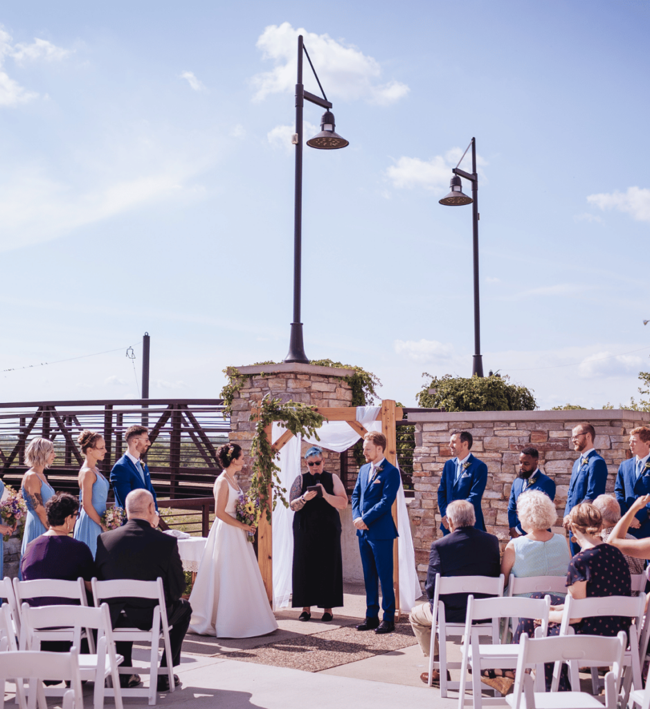 Image of a couple getting married at Elm Creek Park reserve one of the Minneapolis Wedding Venues that has outdoor and indoor wedding ceremony options. 
