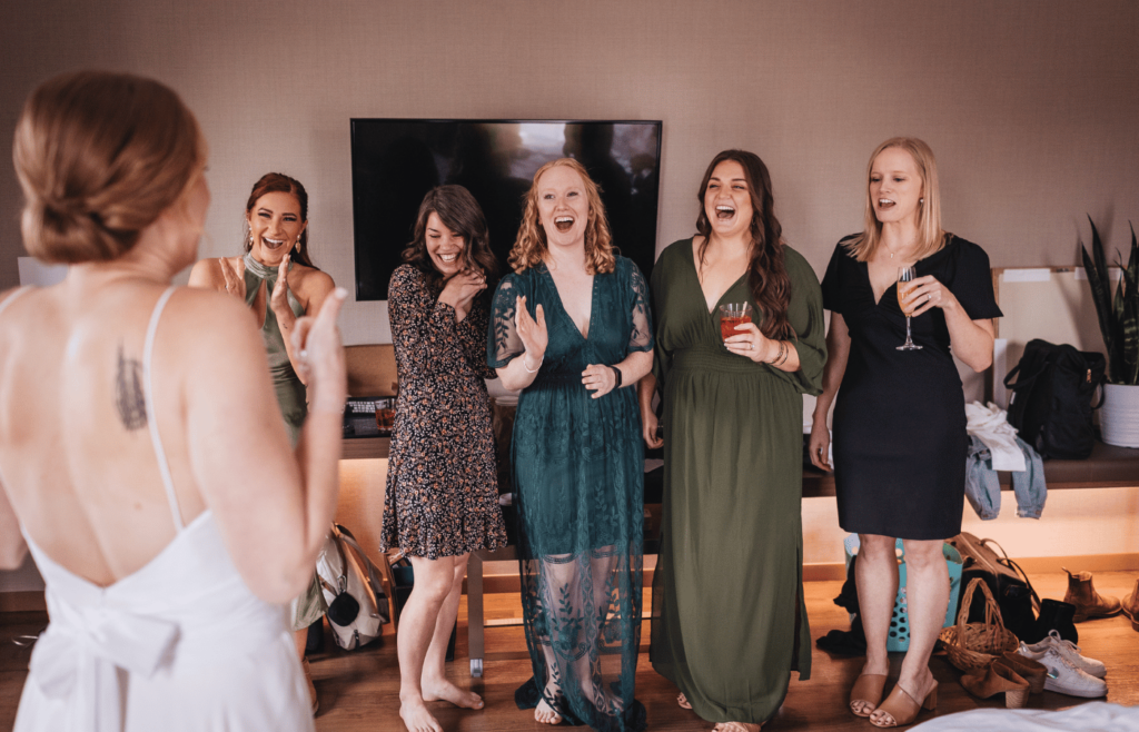 Image of a bride doing a first look with her bridesmaids! 