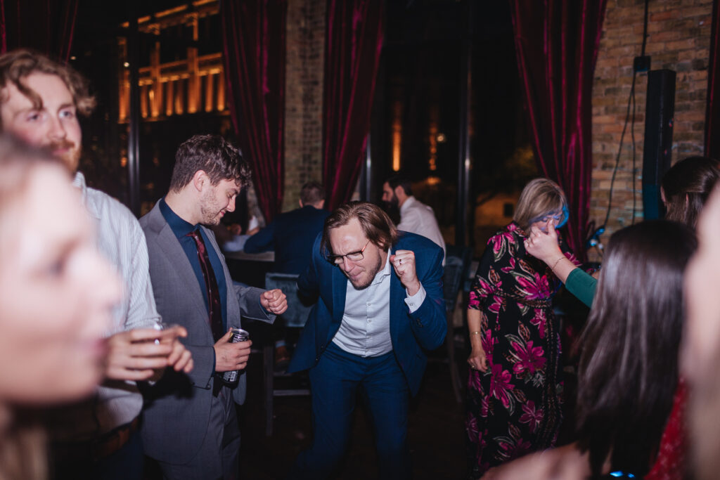 energy on the dance floor at a wedding in minneapolis