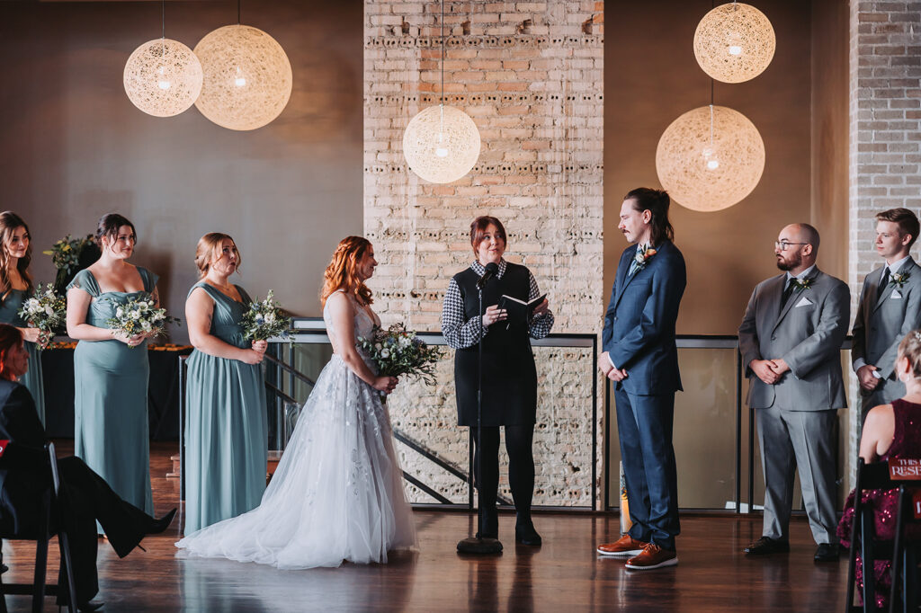 Wedding at FIVE Event Center in Minneapolis - Ceremony toward the hanging lights