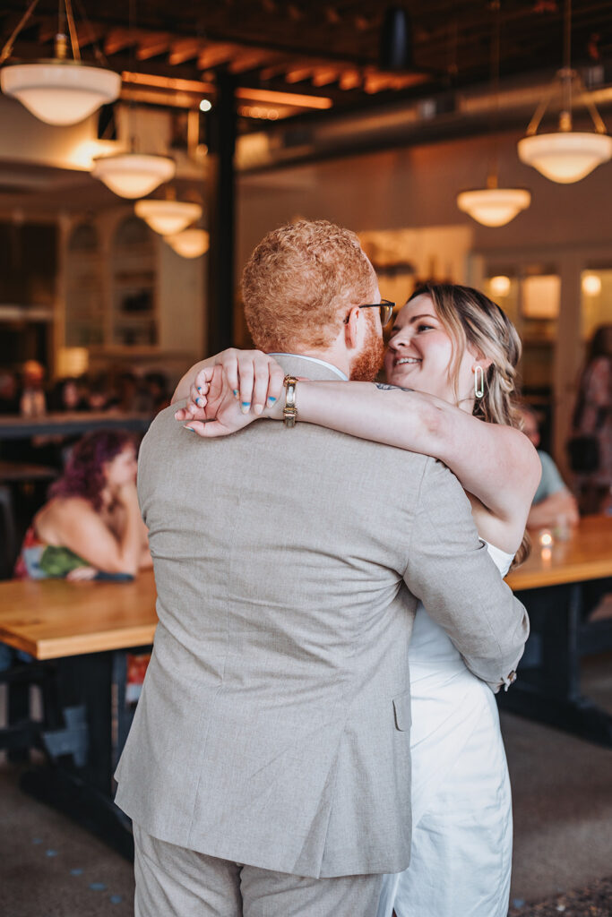 Couple dancing inside The Lynhall in Uptown Minneapolis